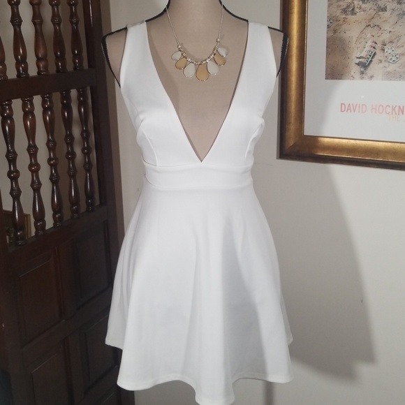 Nasty Gal Dresses & Skirts - Nasty Gal ivory mini dress, sleeveless.  Size XS